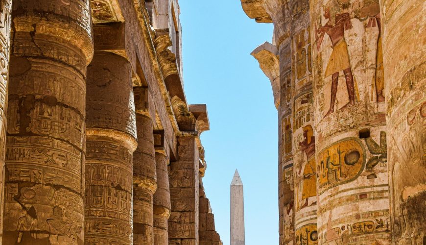 Explore the majestic columns and hieroglyphs at Karnak Temple in Egypt.