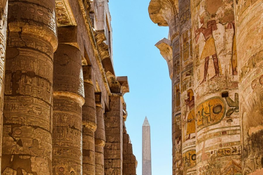 Explore the majestic columns and hieroglyphs at Karnak Temple in Egypt.